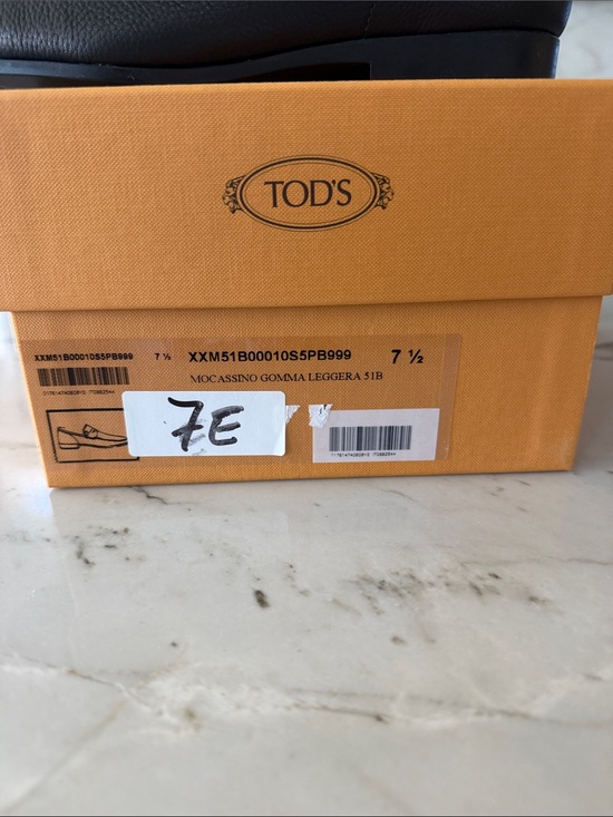 Tod\'s Black Pebbled Leather Penny Loafers for Men